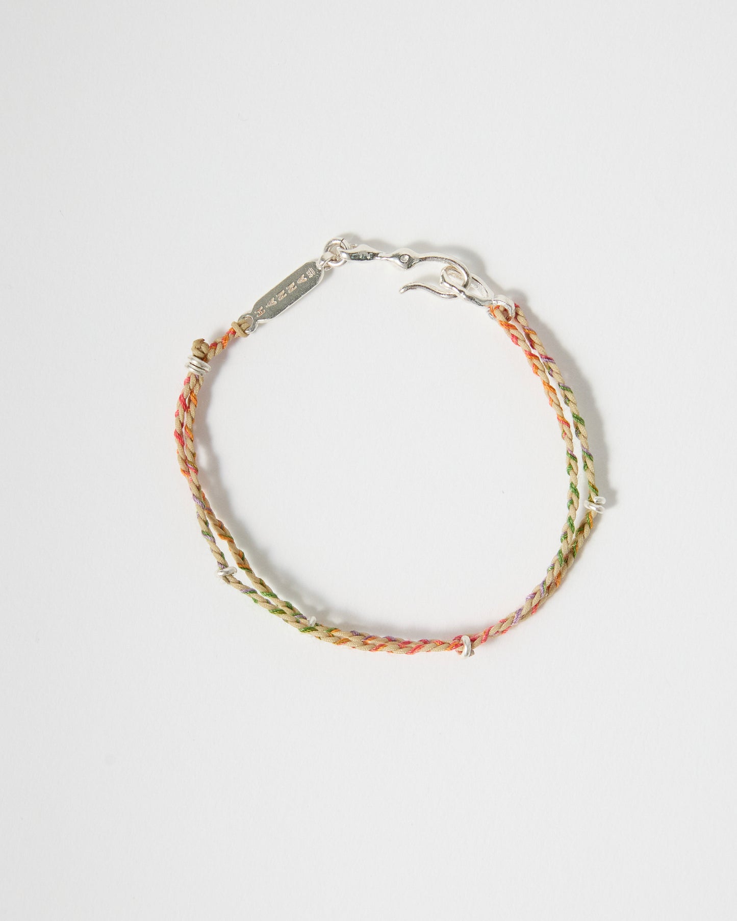 Minimalist woven bracelet with multicolor pastel threads and sterling silver clasp
