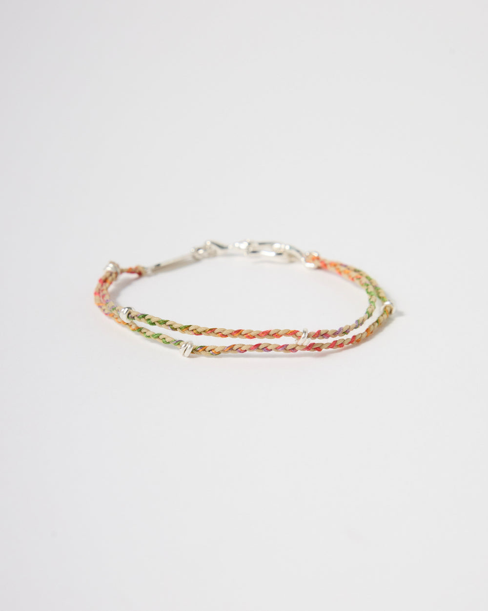 Handwoven multicolor cord bracelet with sterling silver accents, minimalist rainbow bracelet