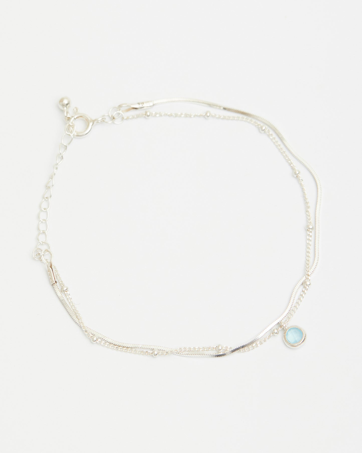 Minimal sterling silver layered chain bracelet with soft blue charm