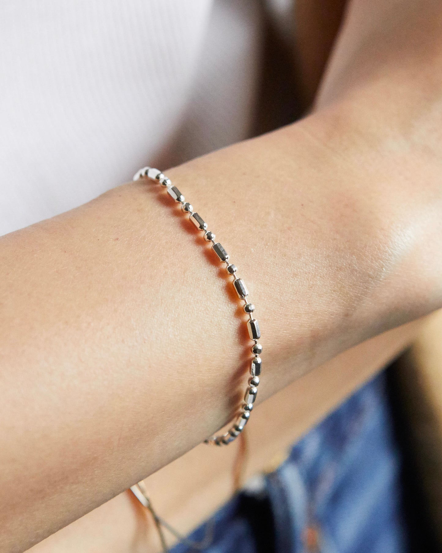 silver bracelet with modular construction, balanced geometry and understated shine