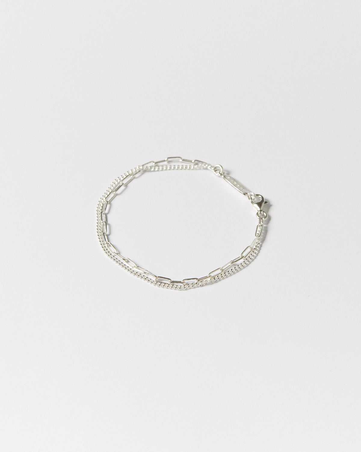 silver sync bracelet – twist of texture for that perfect harmony | HANNA543