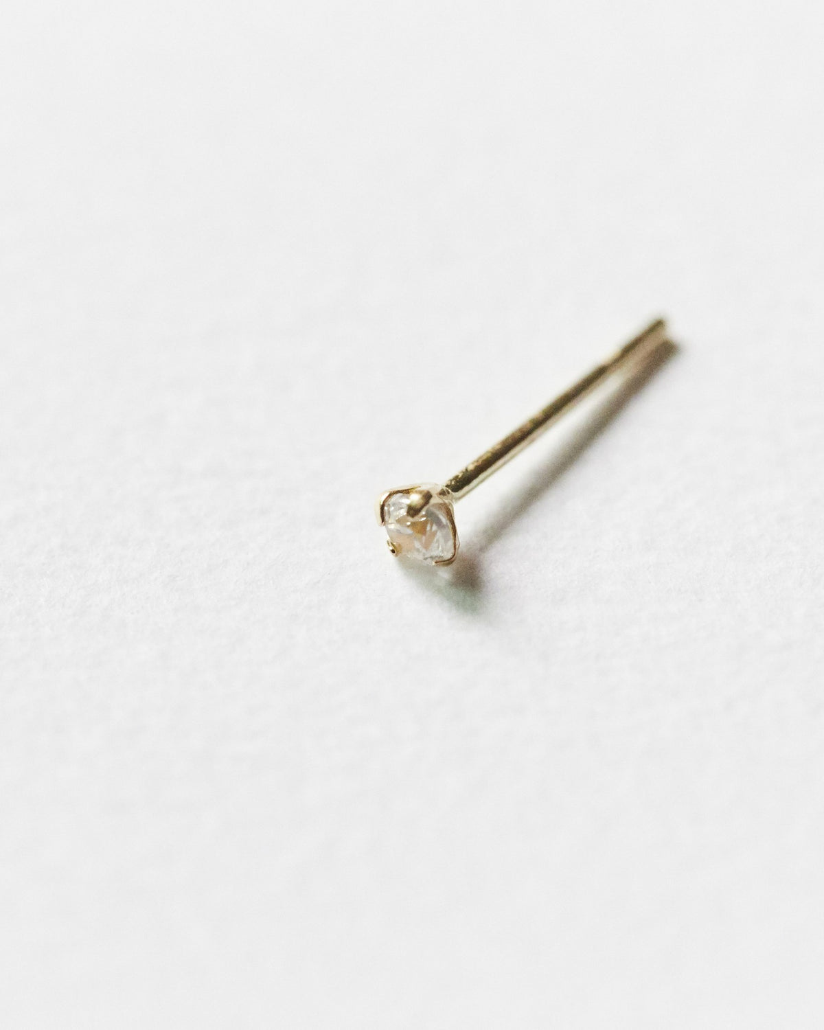 14K solitaire stud – a single clear stone set in solid 14K gold | HANNA543