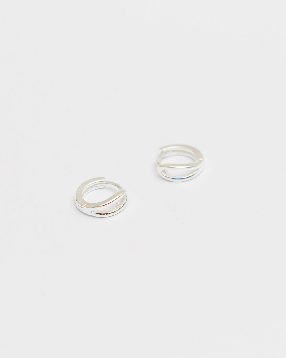 E908 spark click huggie earring in 925 sterling silver by HANNA543