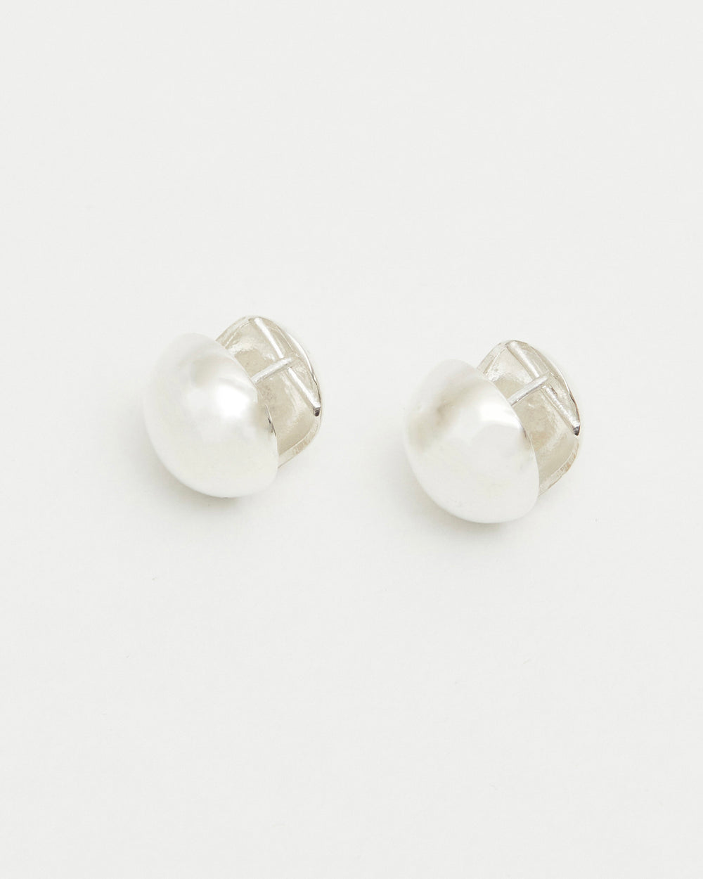 silver dome stud earrings minimalist rounded reflective silver jewelry everyday studs