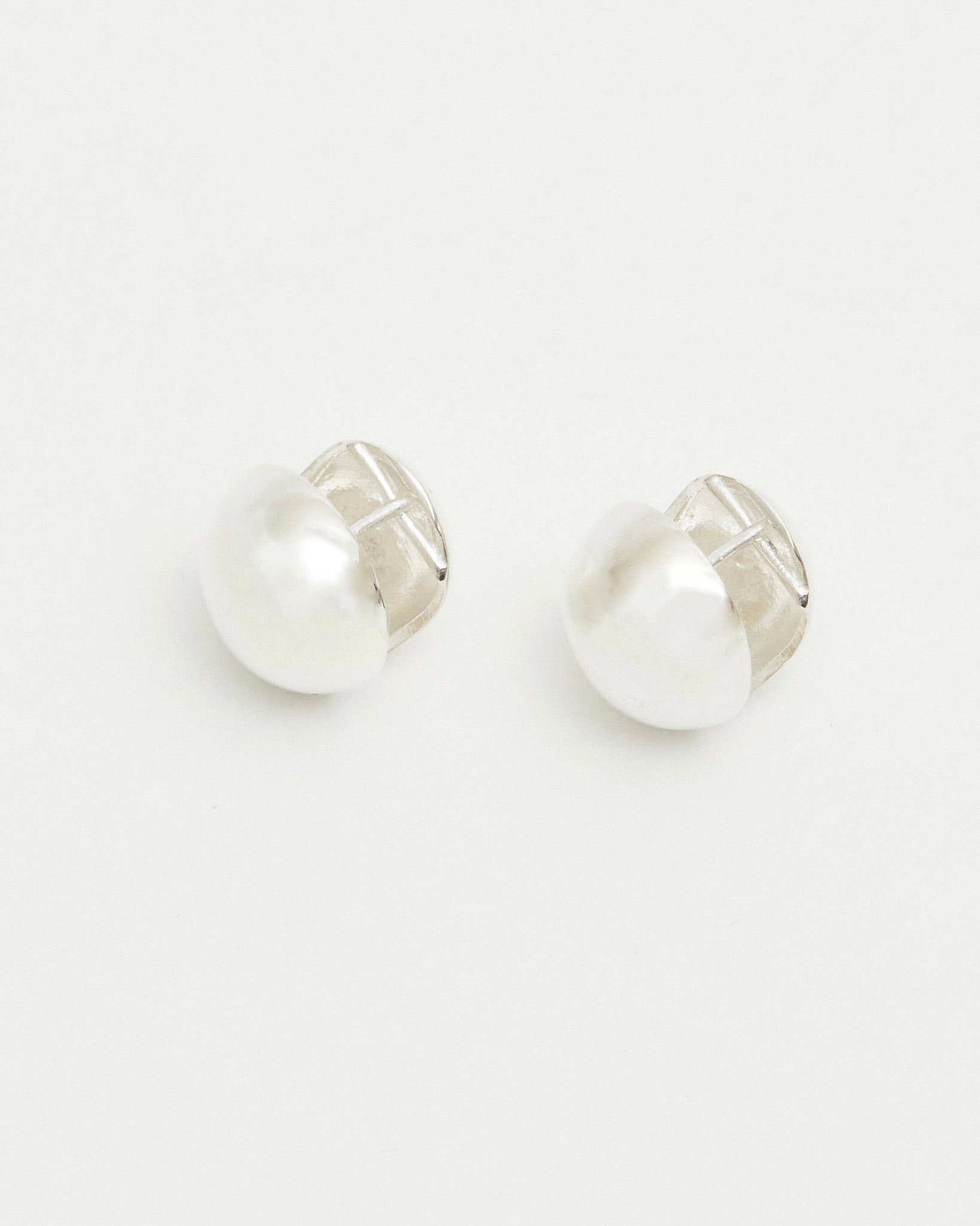 silver dome stud earrings minimalist rounded reflective silver jewelry everyday studs