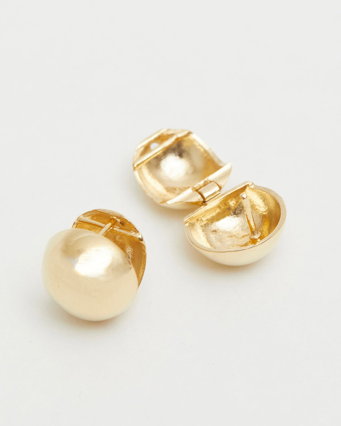 gold dome stud earrings open hinge back detail structured bold gold earrings