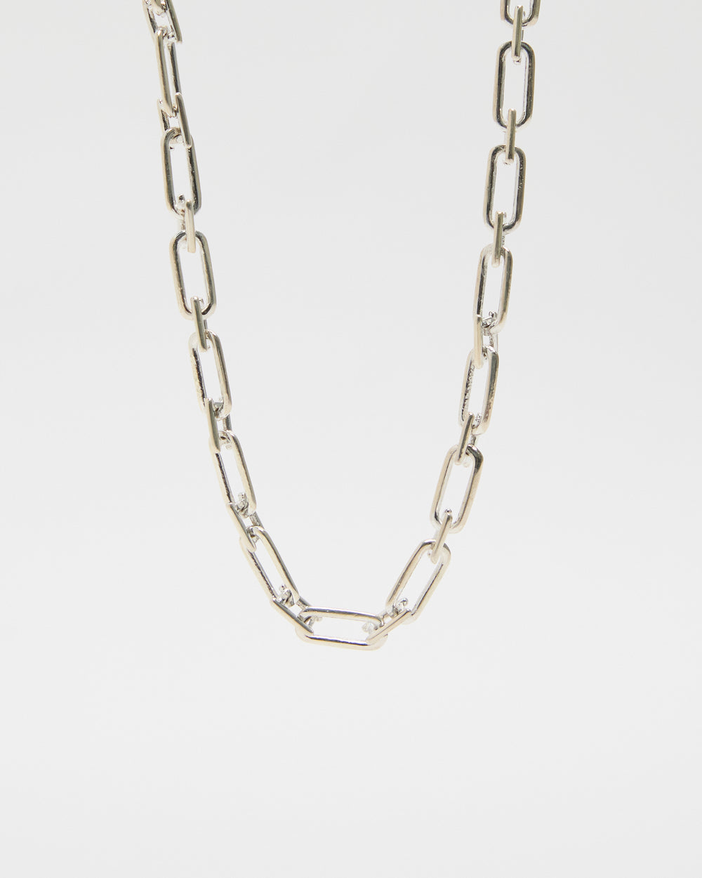 polished sterling silver link chain necklace, rectangular links with high-polish finish, contemporary minimalist jewelry design, layering-ready chain accessory for women