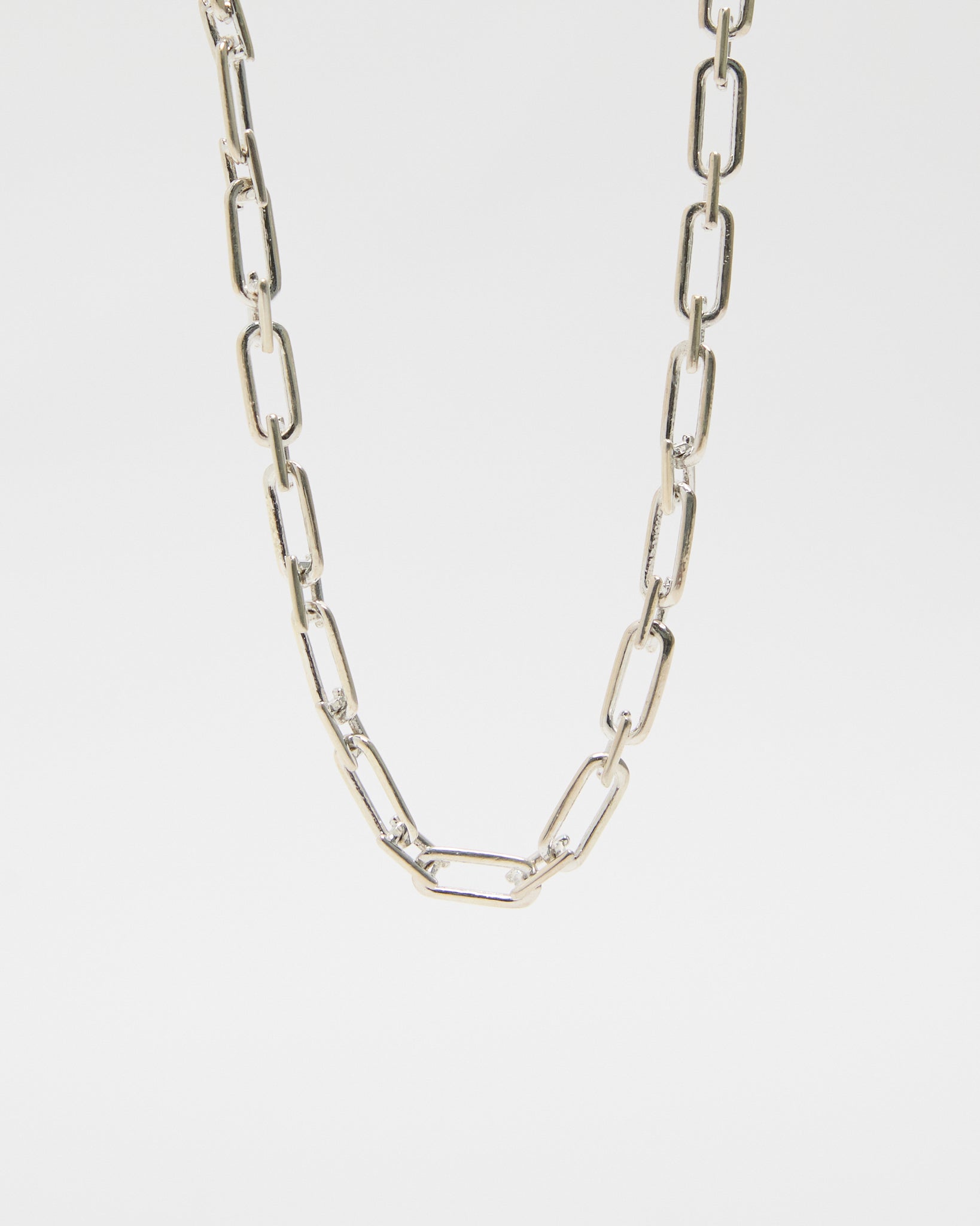 polished sterling silver link chain necklace, rectangular links with high-polish finish, contemporary minimalist jewelry design, layering-ready chain accessory for women