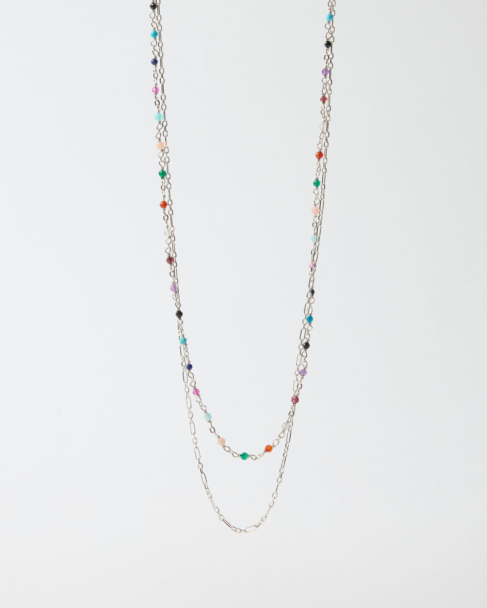 Hanging layered sterling silver necklace with multicolor gemstone accents