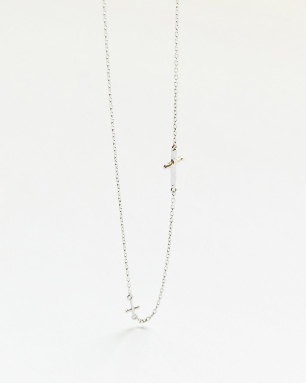 Sterling silver chain necklace with two tiny sideways crosses, hanging – HANNA543 N314 twin cross chain