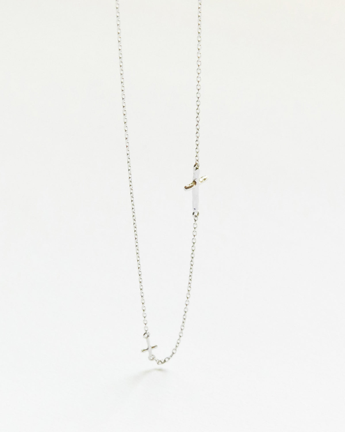 Sterling silver chain necklace with two tiny sideways crosses, hanging – HANNA543 N314 twin cross chain