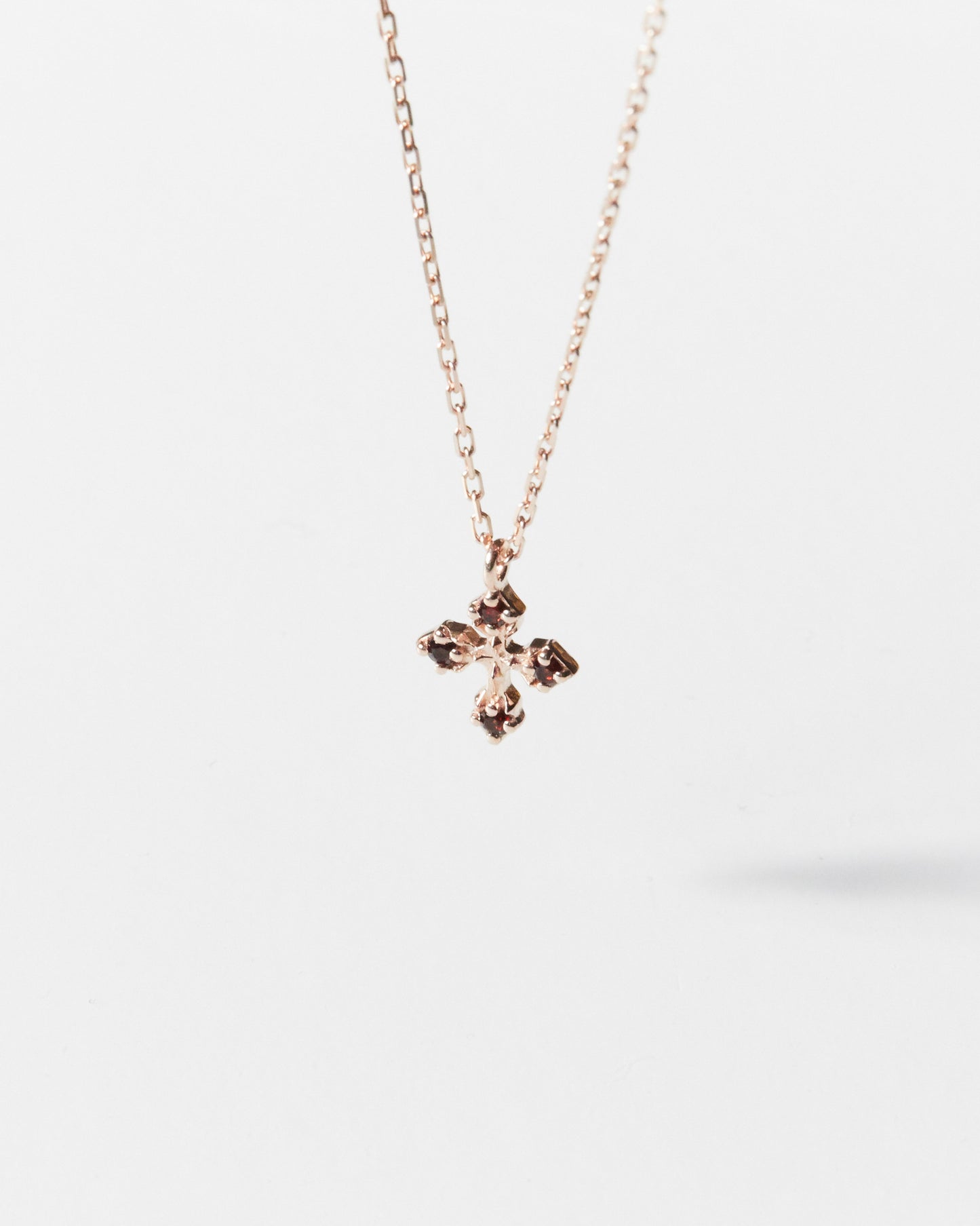 N334 - rosy bloom cross *in stock