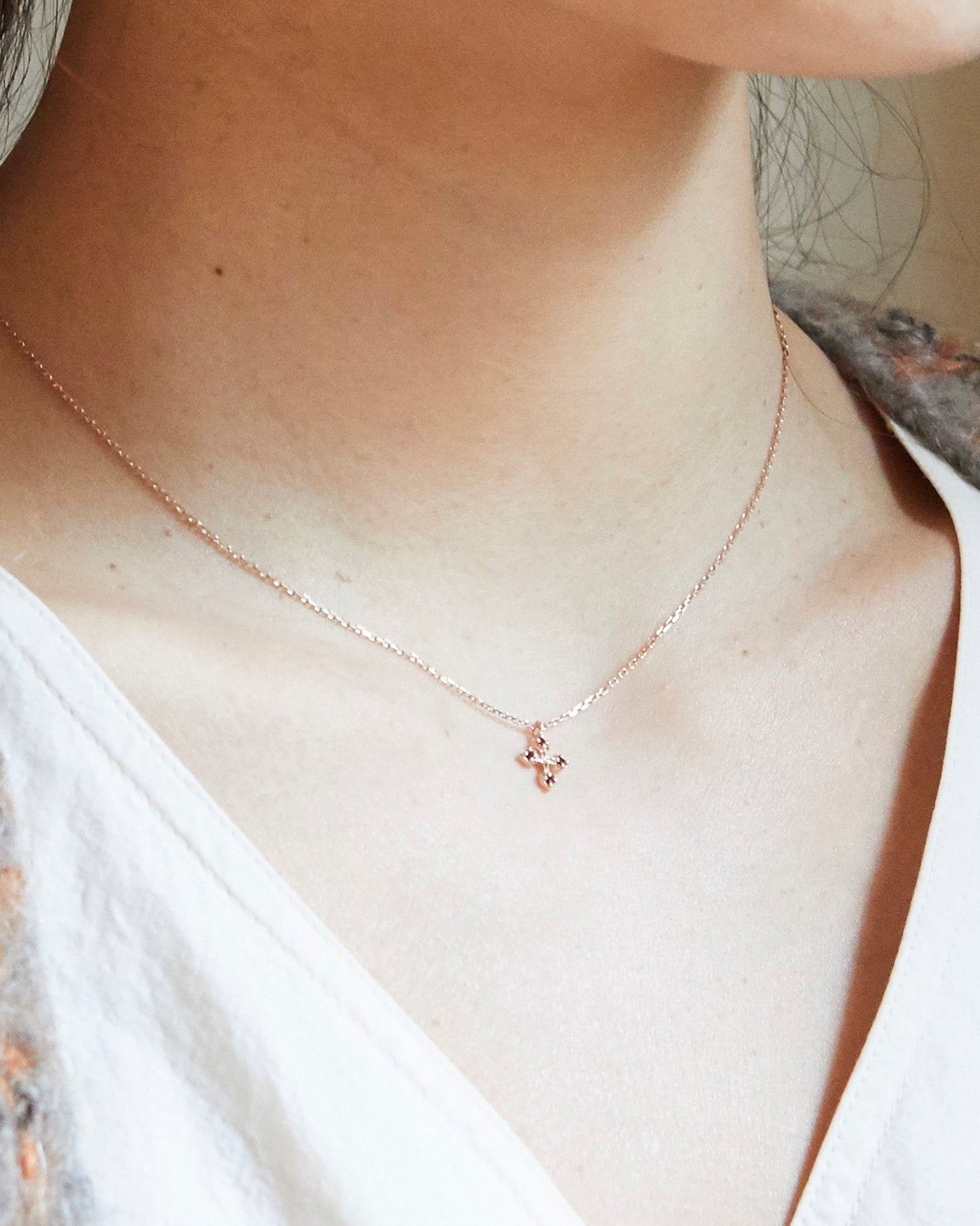 N334 - rosy bloom cross *in stock