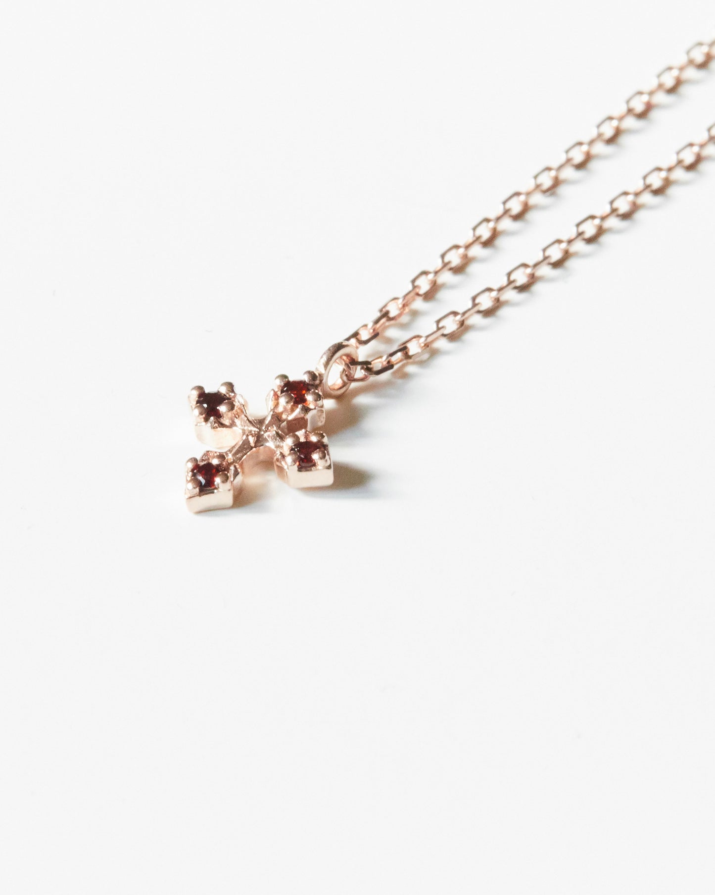N334 - rosy bloom cross *in stock