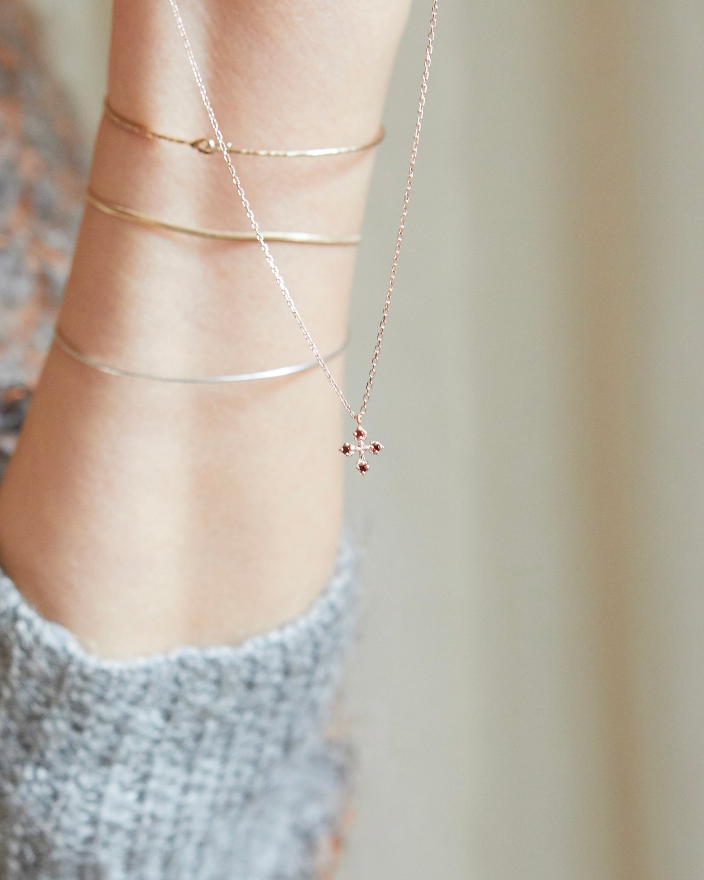 N334 - rosy bloom cross *in stock