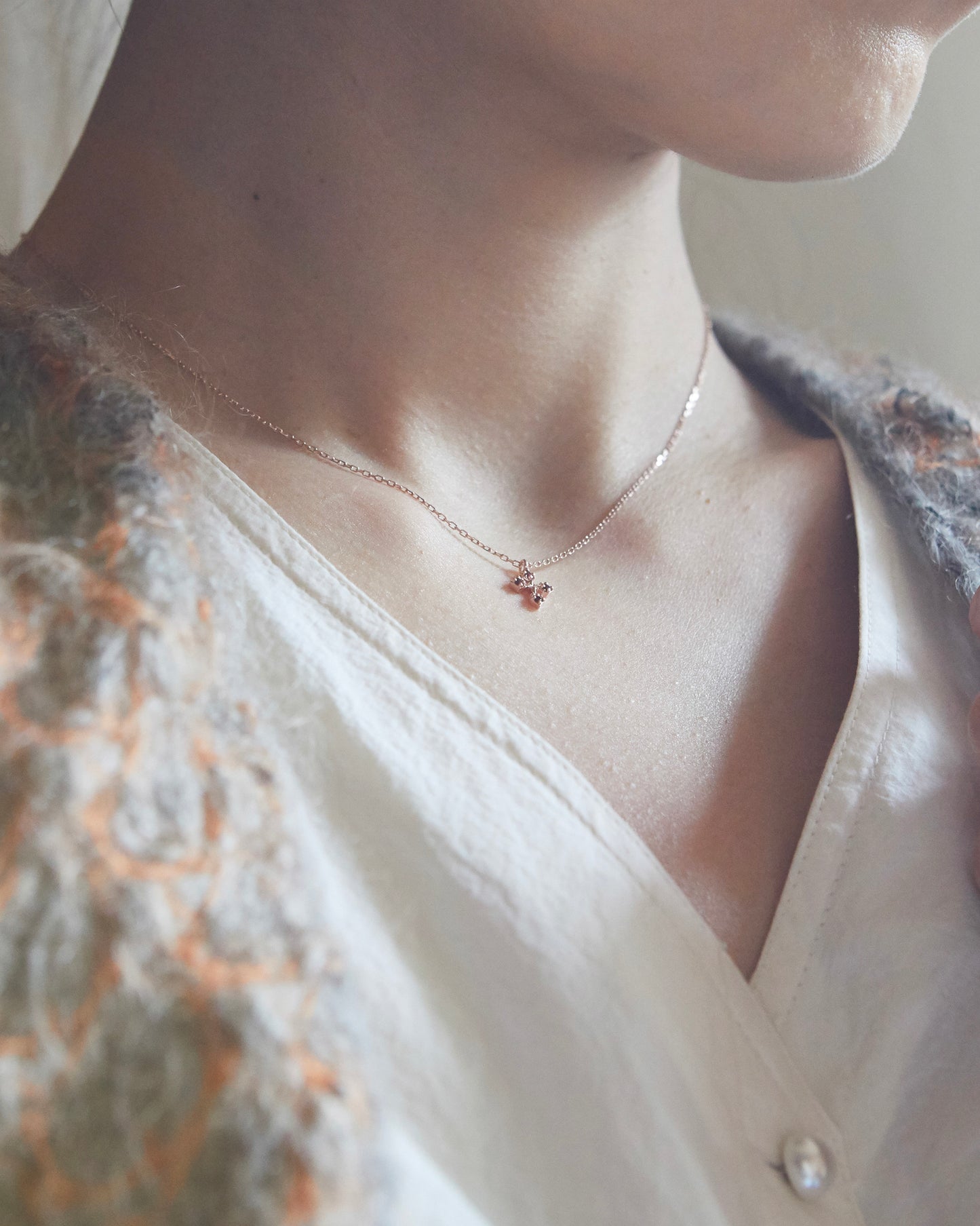 N334 - rosy bloom cross *in stock