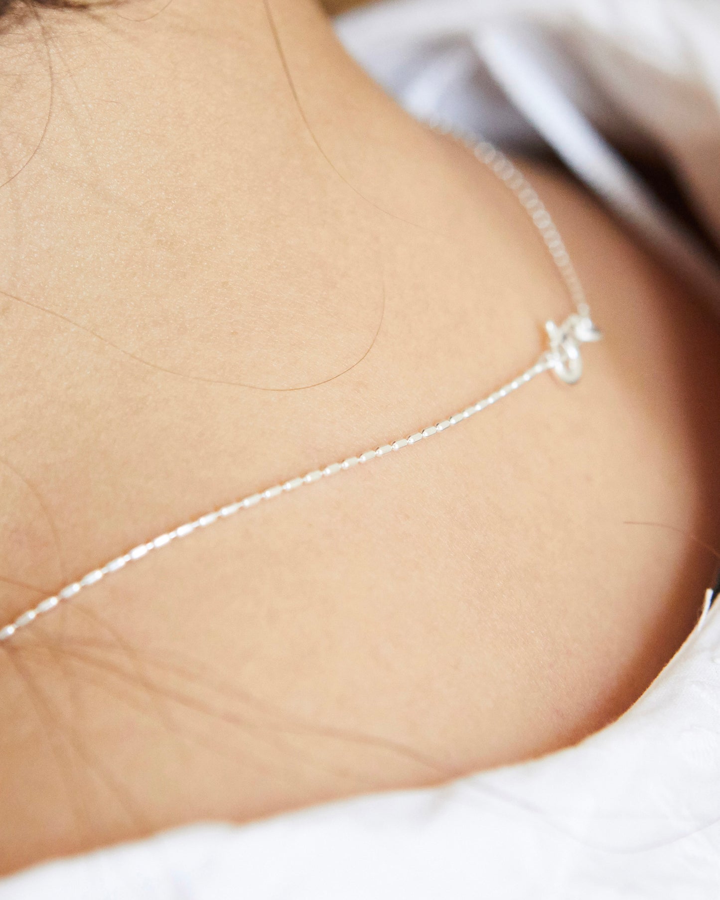 that one minimal silver chain you forget you’re wearing but somehow completes every outfit