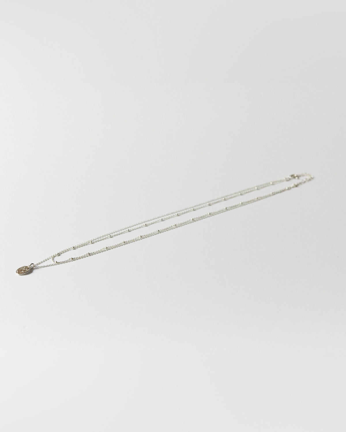 N357 - venus coin double chain