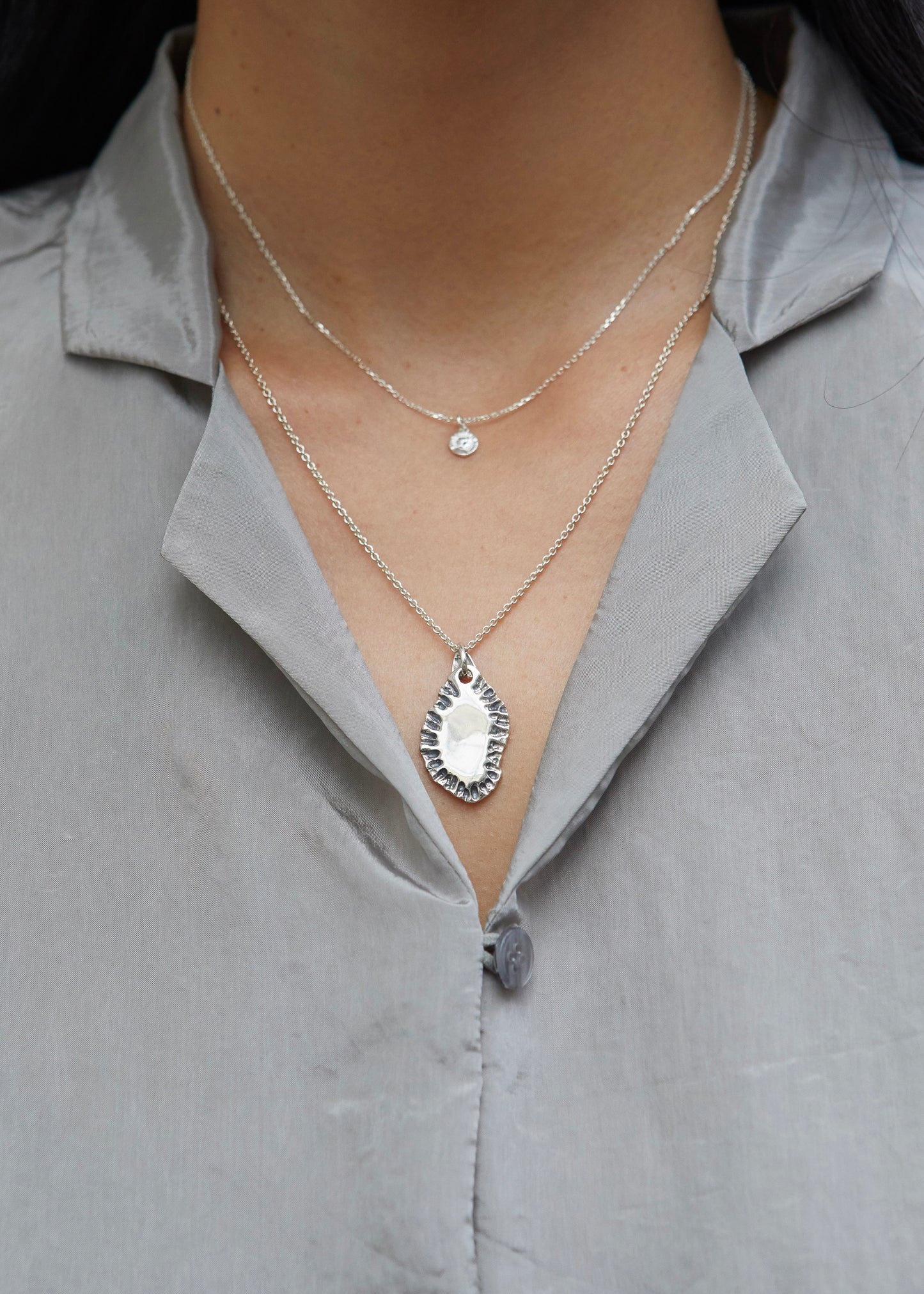 N502 - etched tide pendant