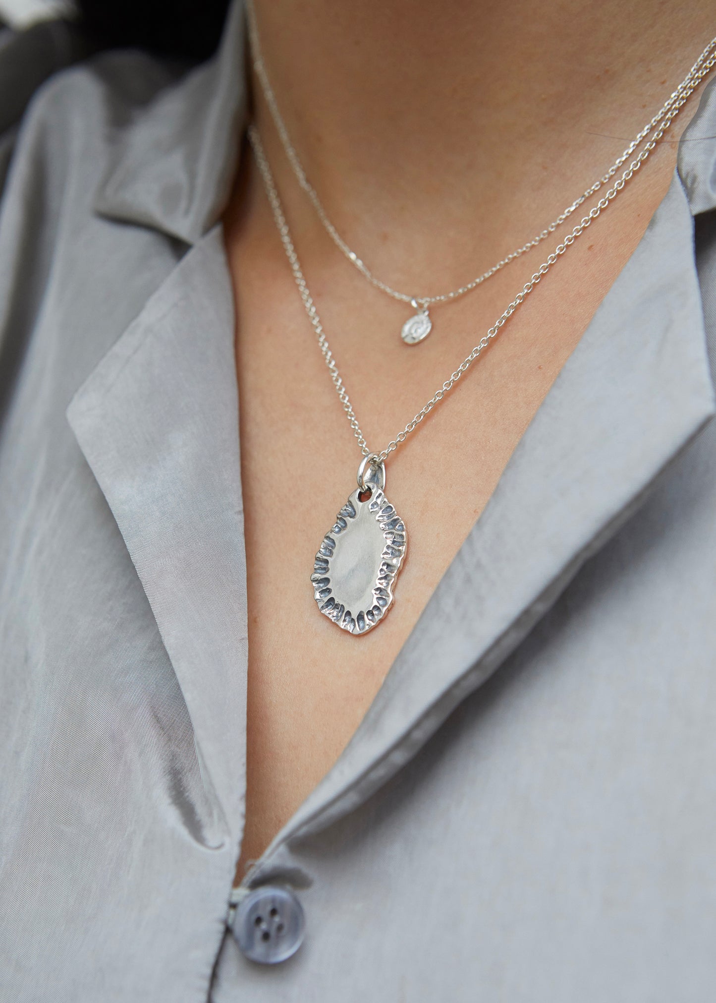 N502 - etched tide pendant