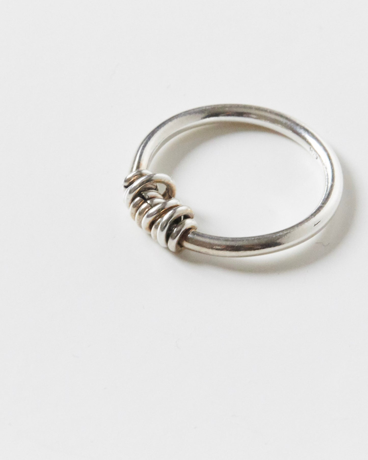 coiled detail sitting quietly like it didn’t just upgrade your entire hand