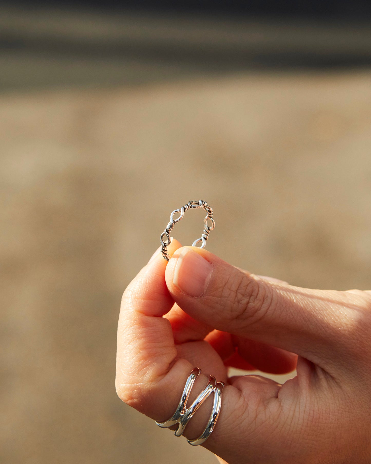 silver loop chain ring with smooth linked design, minimalist everyday jewelry