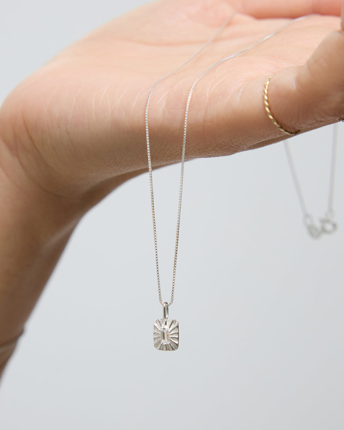 carved charm pendant necklace – 8 x 10 mm charm with a soft, quiet sparkle | HANNA543