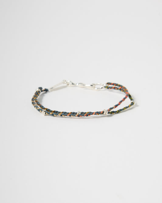 Handwoven earth-tone cord bracelet with sterling silver accents and clasp, minimalist everyday jewelry