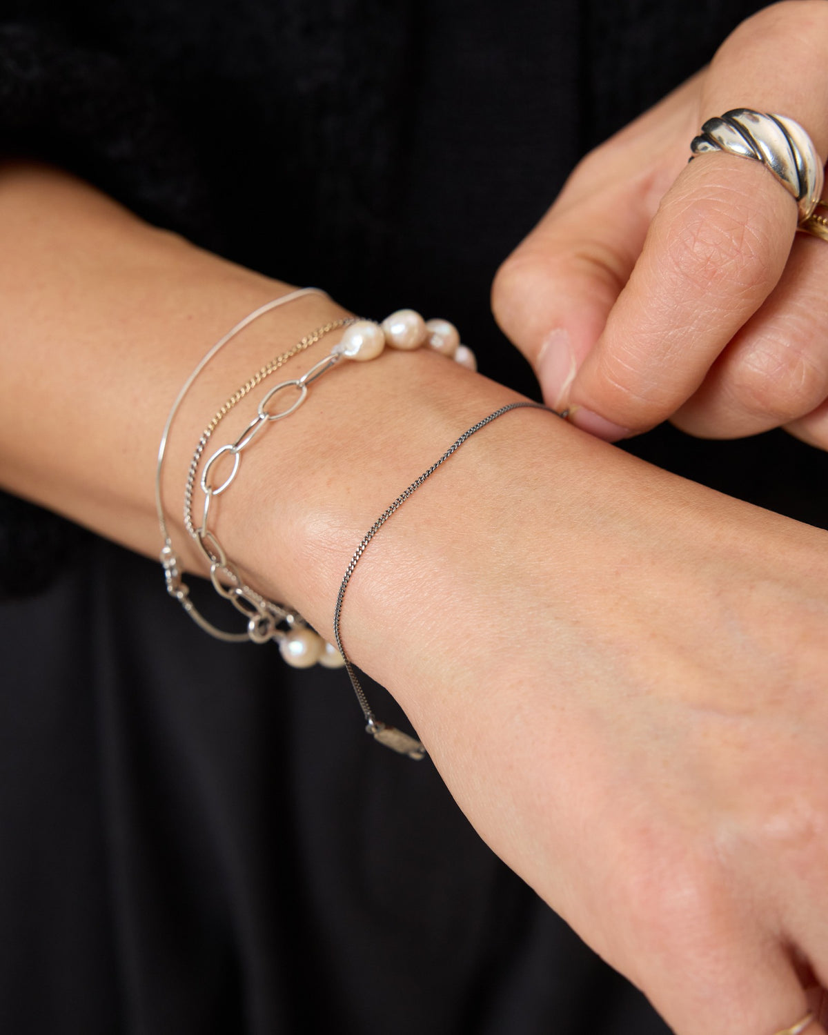 Antique silver curb chain bracelet layered with pearl and silver bracelets – HANNA543 B1045 whisper curb chain