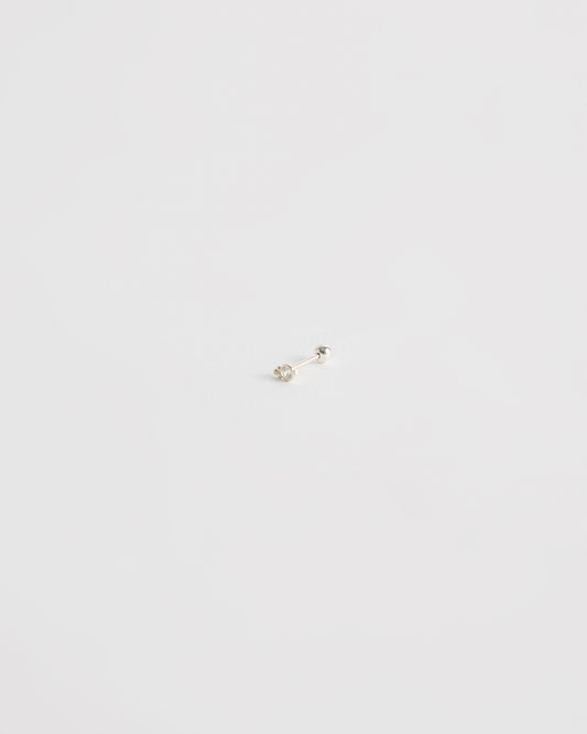 architectural silver stud earring with centered stone and minimal geometric structure