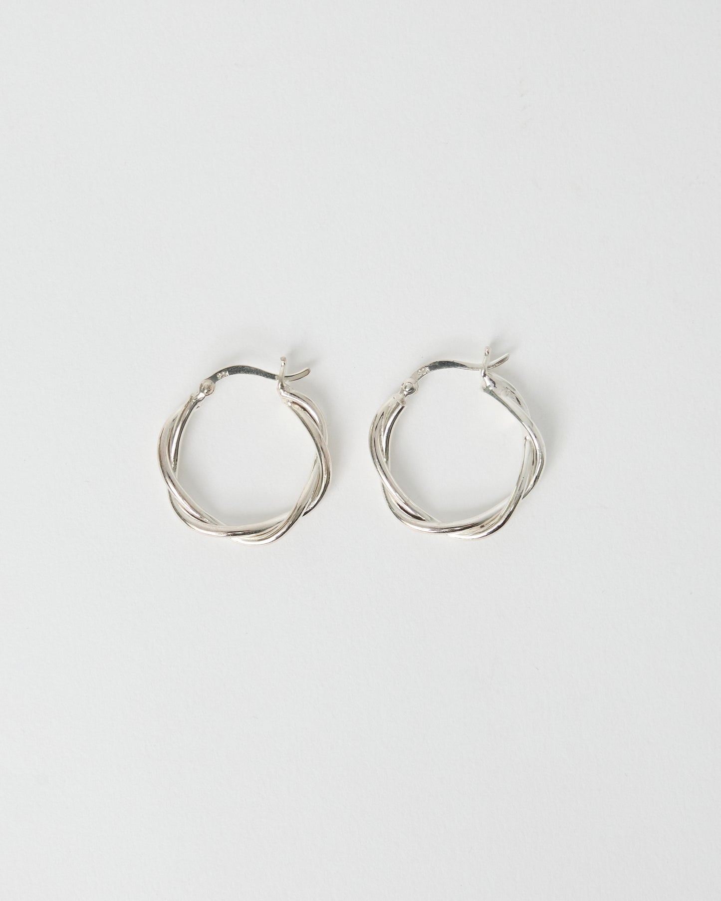 Authentic HANNA543 E324 Silver Twisted Hoop Earrings worn by BTS Jimin. Bold 925 sterling silver hoops