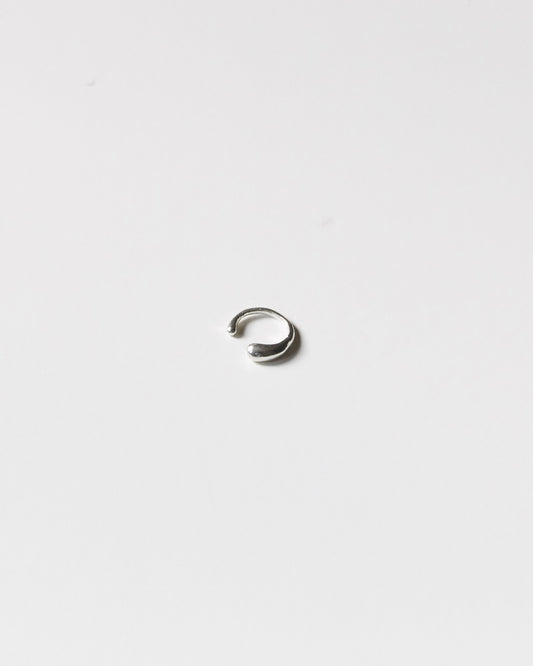 Sterling silver drop ear cuff on a light gray background – HANNA543 E735 falling drop cuff