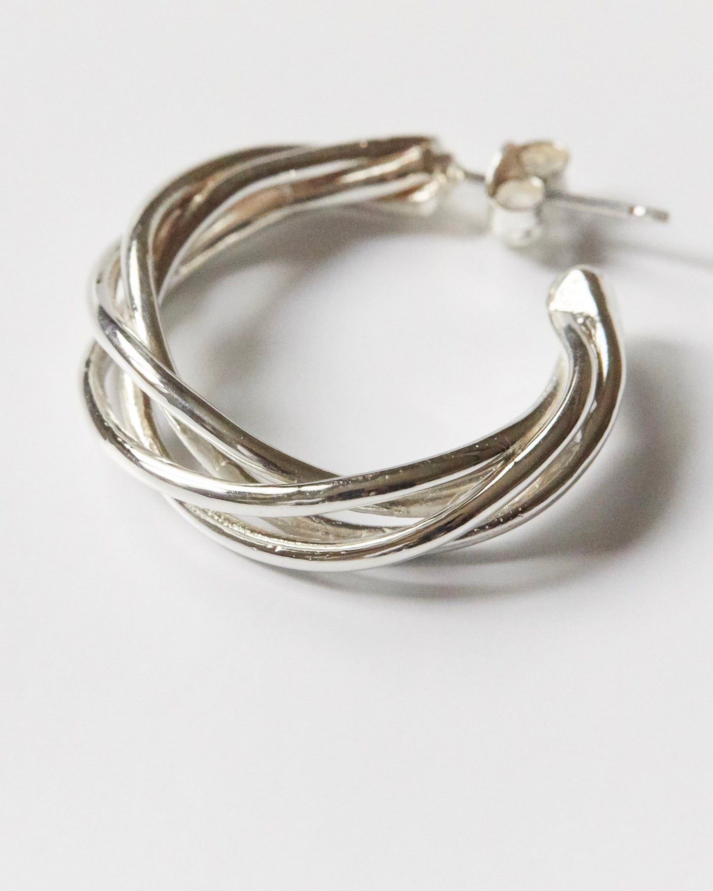 close-up detail of handcrafted sterling silver texture on HANNA543 E783 earrings