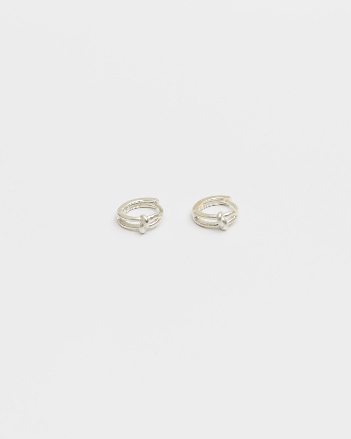 Sterling silver knot hoop earrings, front view – HANNA543 E906 click circle hoops