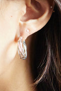 E783S - silhouette spiral hoop earrings