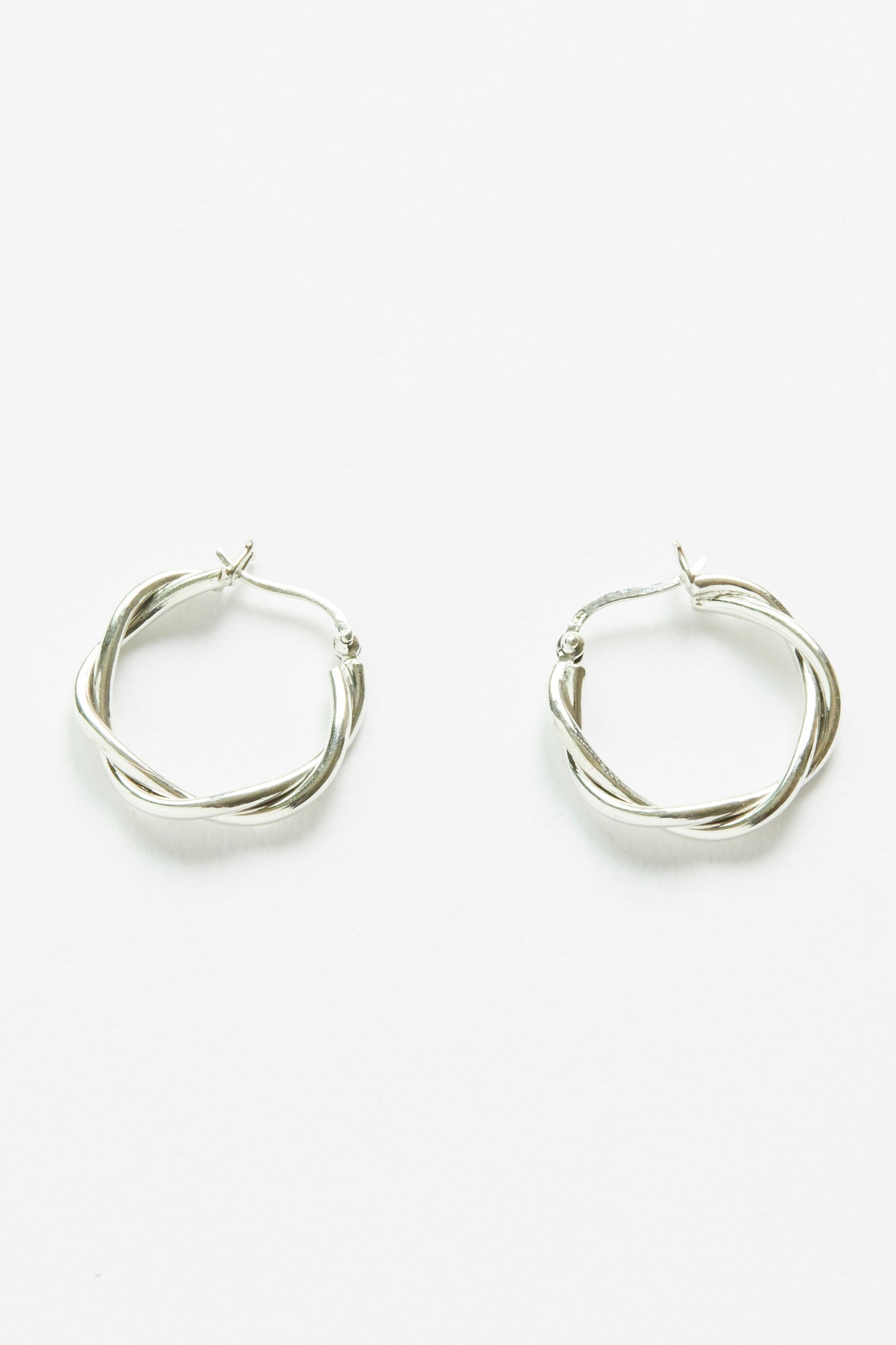 E324S - silver twisted hoops