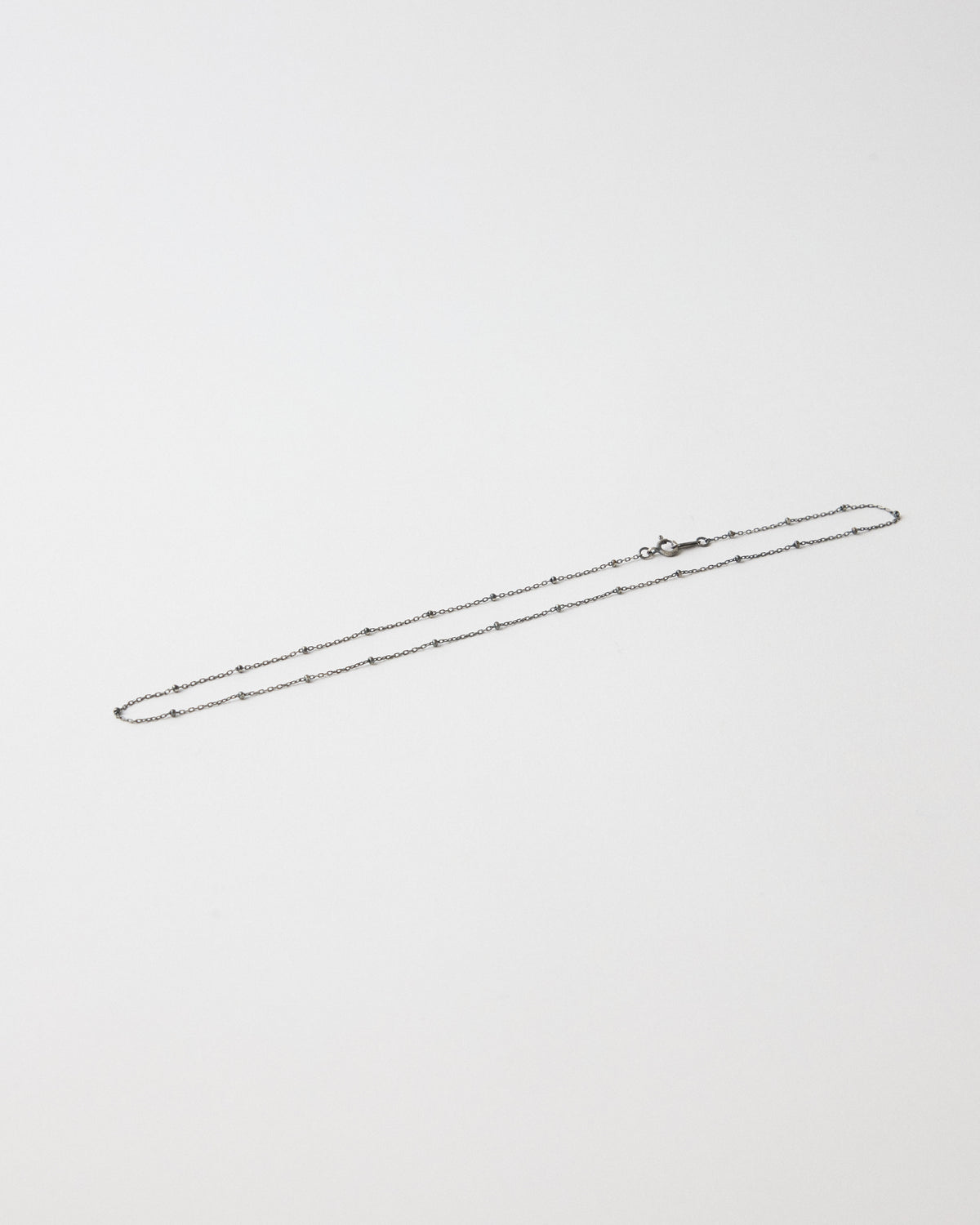 Antique silver ball station chain necklace laid flat with clasp – HANNA543 N1057 starlit dot chain
