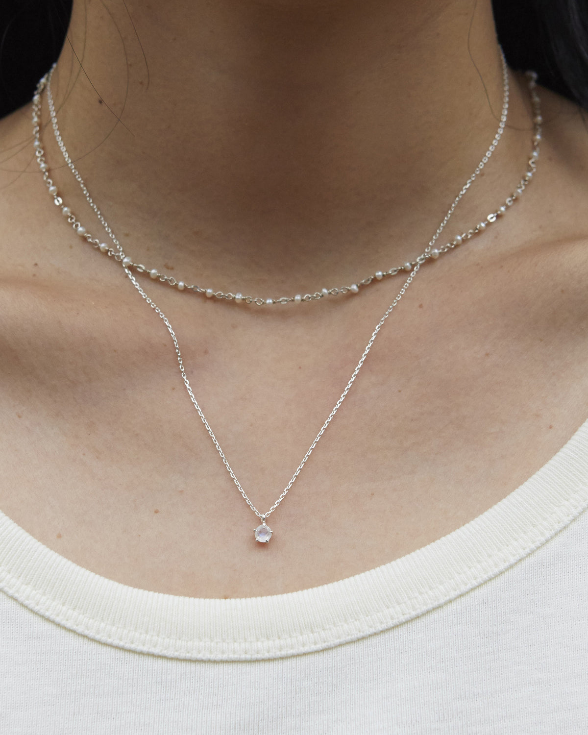 moonstone aperture necklace – a single point of light on a fine vertical line | HANNA543
