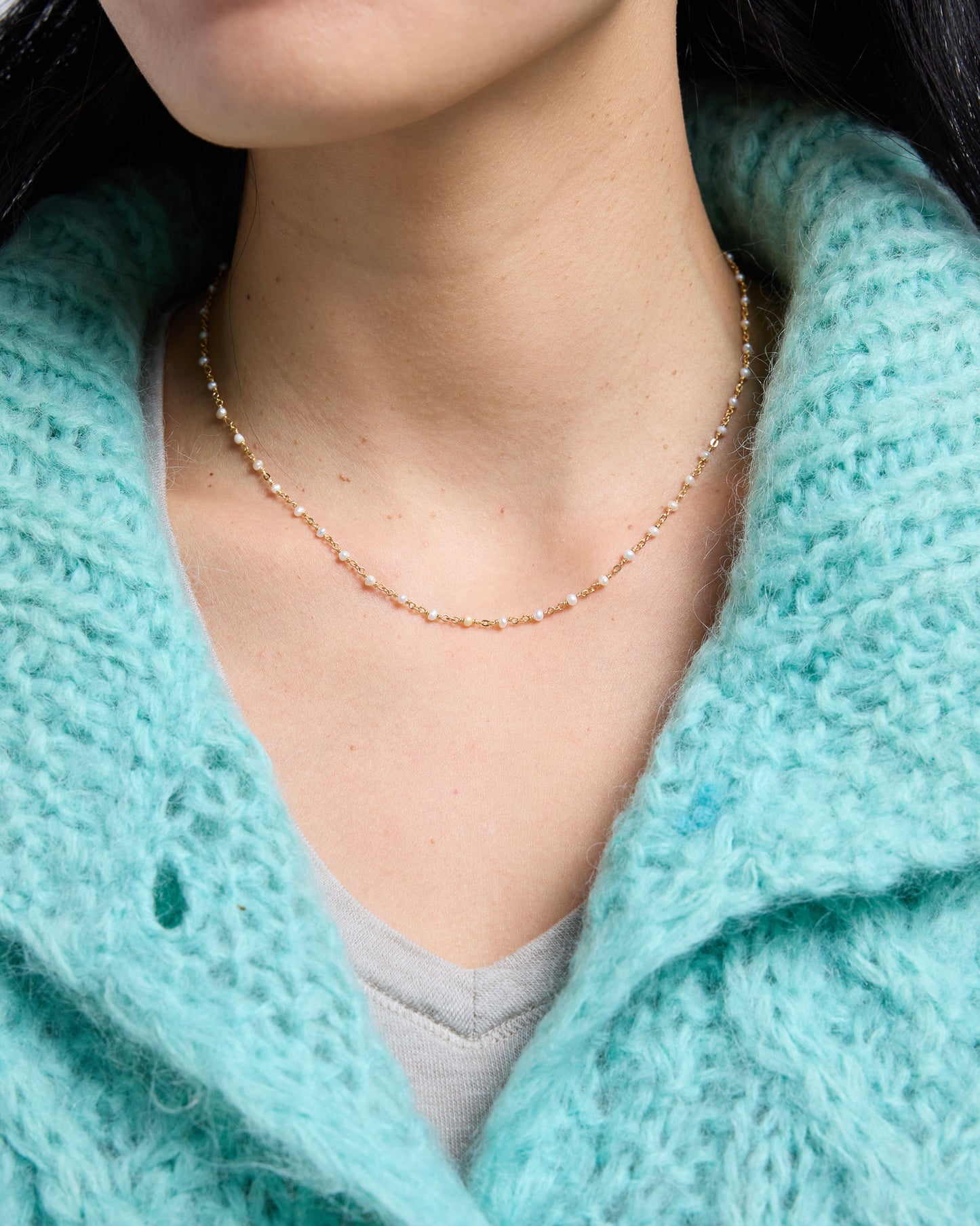 a warm gold version with small pearls adding soft contrast