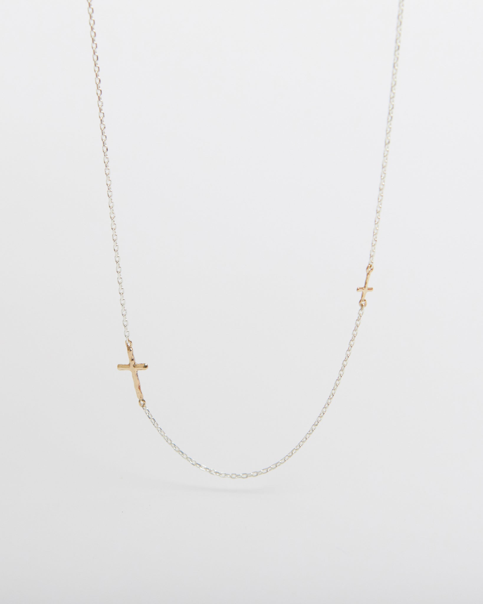 N385 - inner light dual cross necklace *in stock