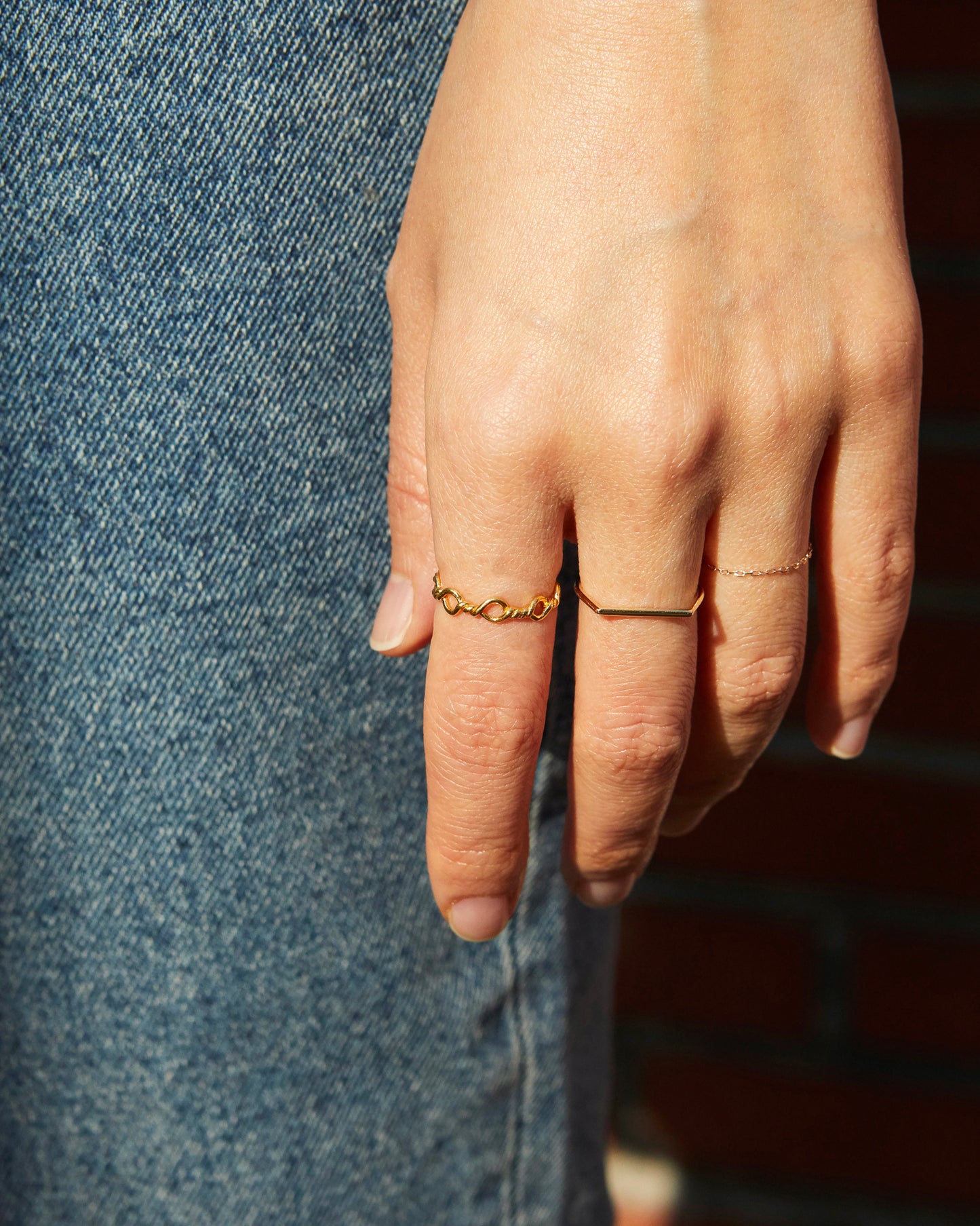 gold loop ring resembling a delicate chain design, modern minimalist jewelry