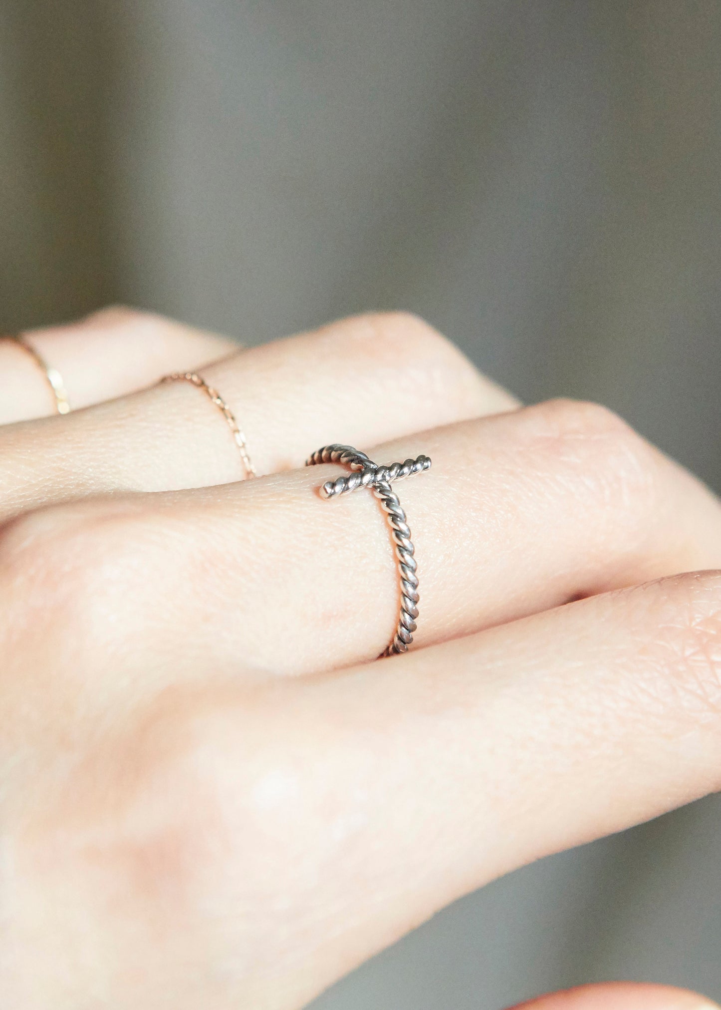 a soft cross detail that feels more personal than decorative